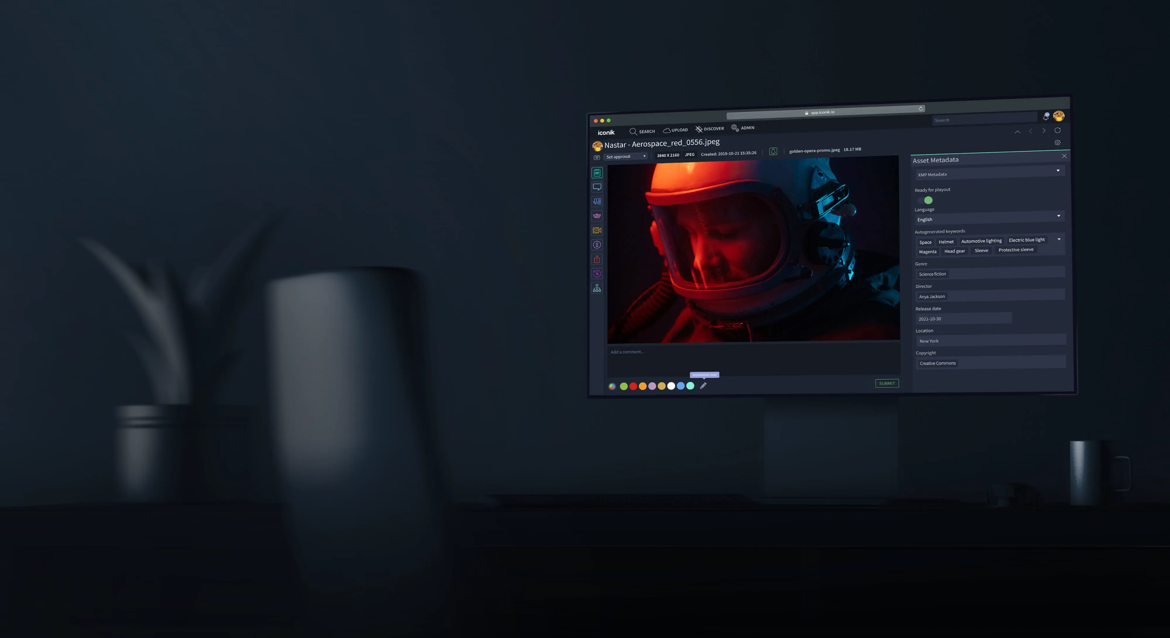 background image of monitor on desk in dim yet colorfully lit abstract office setting