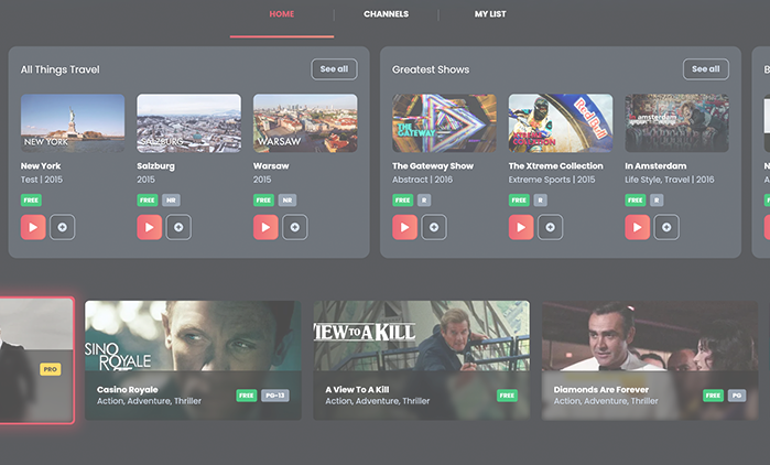 Streaming platform interface displaying movie and show thumbnails. Sections include "All Things Travel," "Greatest Shows," and movie titles like "Casino Royale." Buttons for play and details are present alongside text such as "FREE."